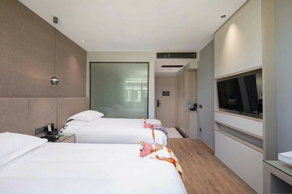 Фото Yiwu Manting City Hotel