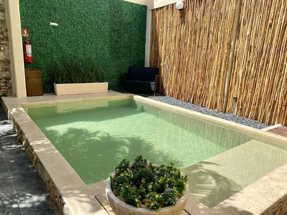 Фото Kuxtal Hotel Boutique