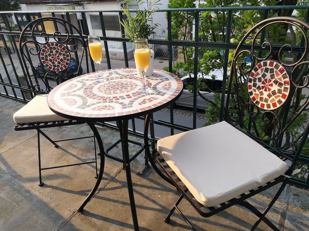 Фото Gäste-Liesel Ferienwohnungen