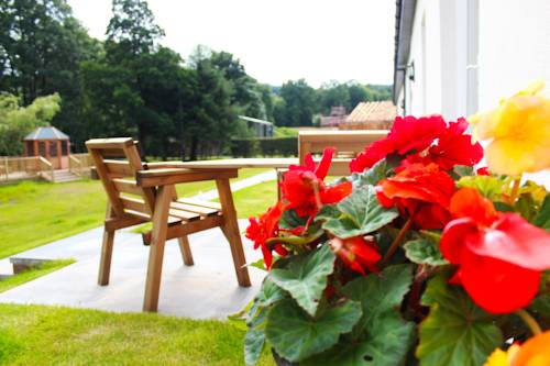 Фото Auchendennan Luxury Self Catering Cottages