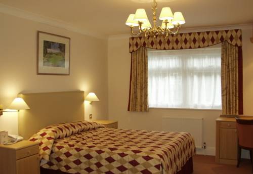 Фото Walton Cottage Hotel and Suites