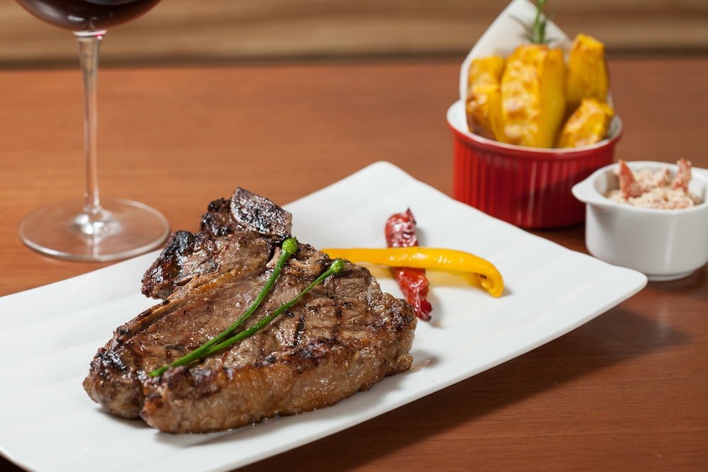 Фото Ramada by Wyndham Macae Hotel & Suites