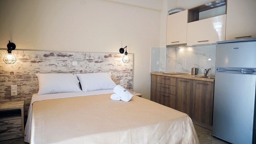 Фото Sinodinos Deluxe Apartments