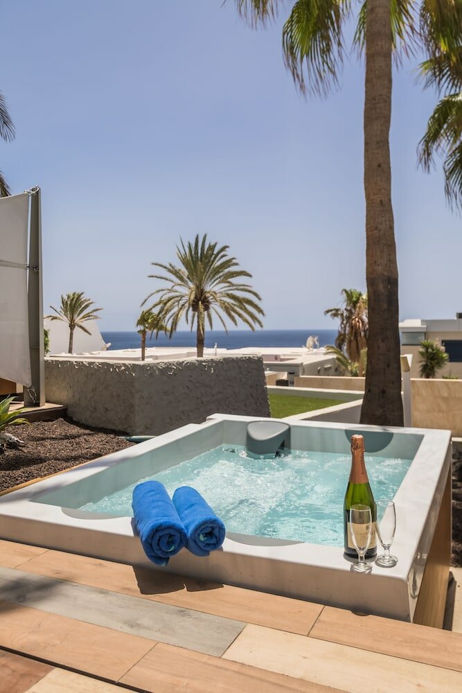 Фото Apartamentos Garden & Sea Boutique Lodging by Livvo