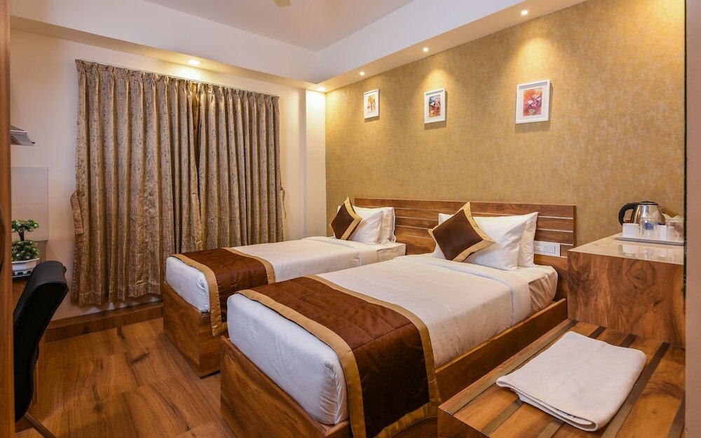 Фото Kensington Suites