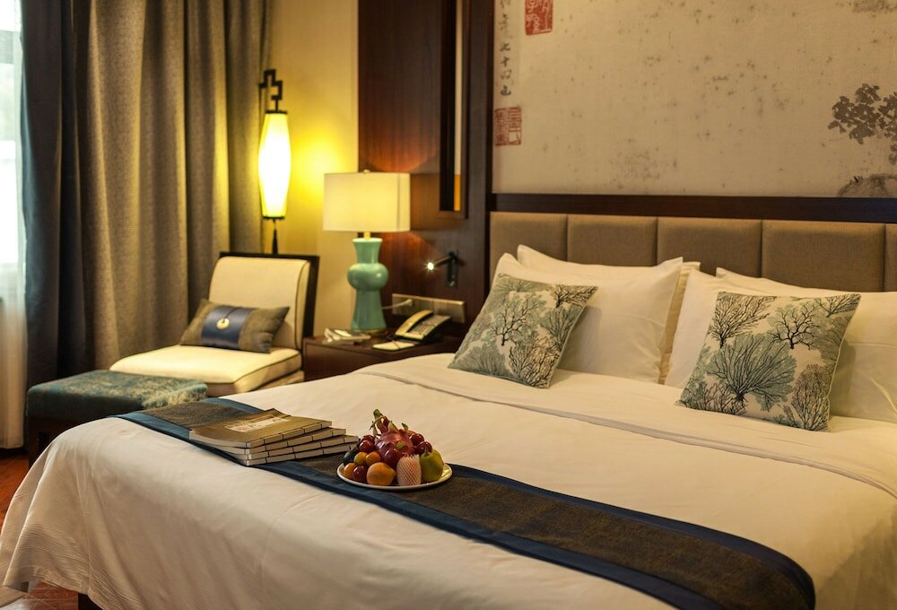 Фото Hejing Chengshang Generations Hotel