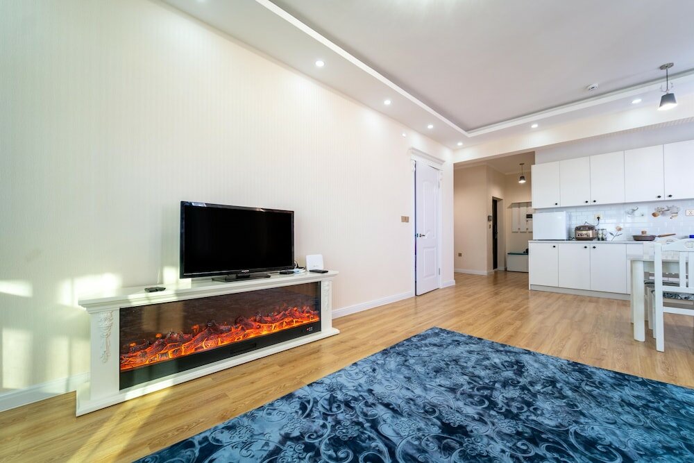 Фото Eagle Town Service Apartment