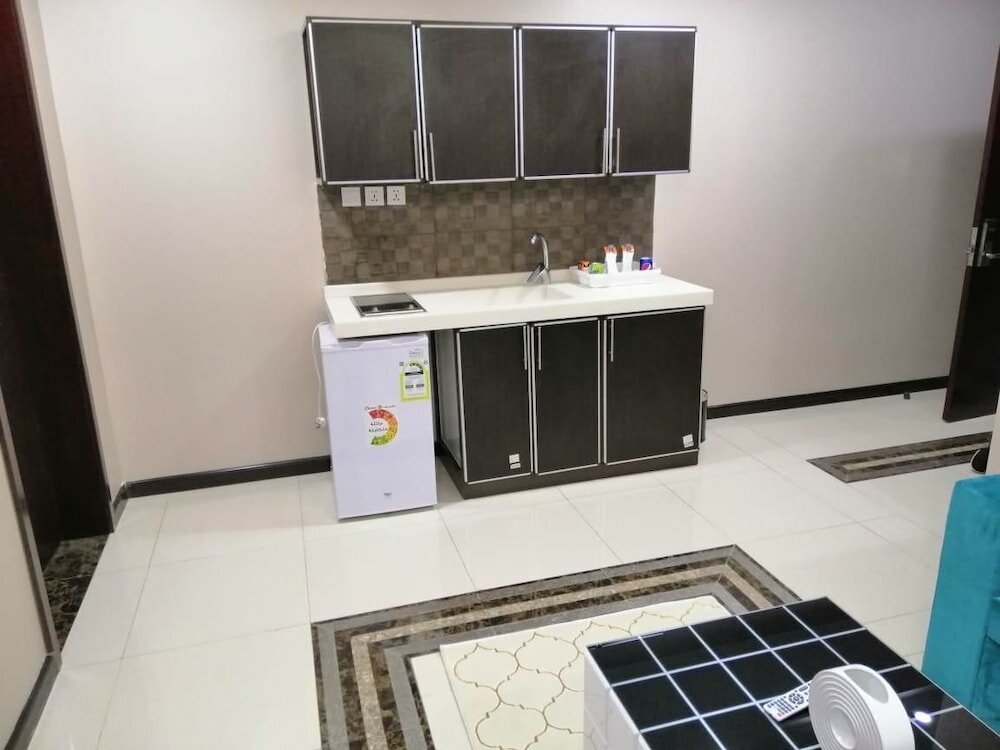 Фото Asalah Hotel Suites