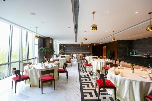 Внешний вид отеля Radisson Exhibition Center Shanghai в Цинпу, фото 3