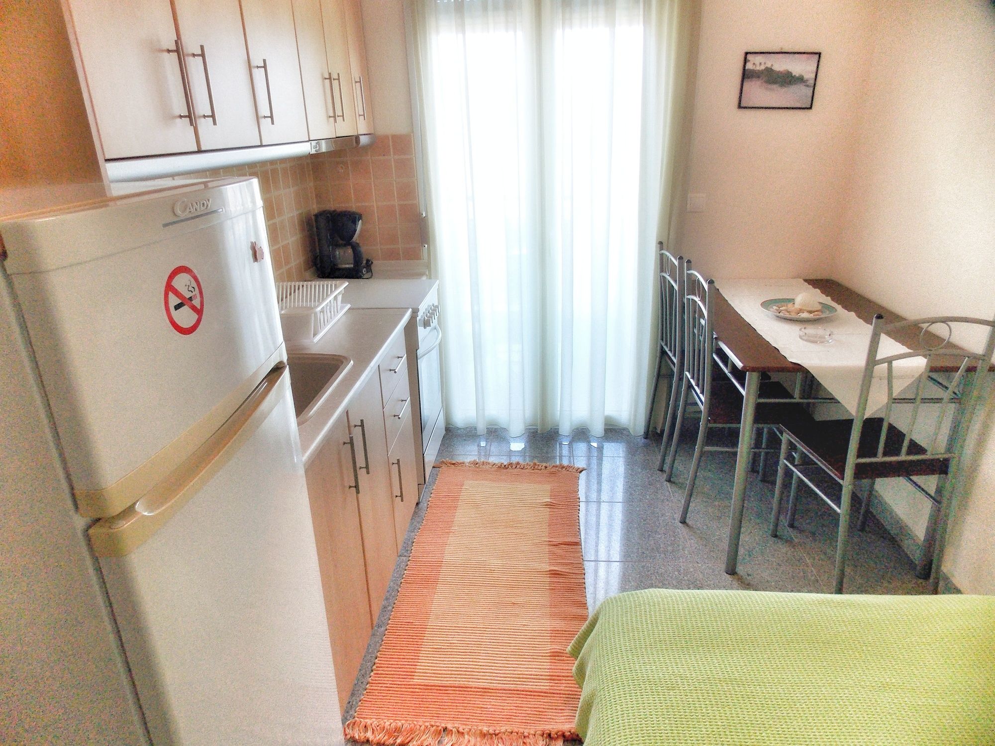 Фото Nikos Apartments