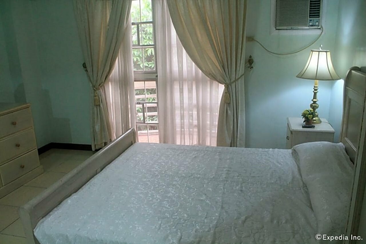 Фото Casa Micarosa Hotel and Residences by RedDoorz