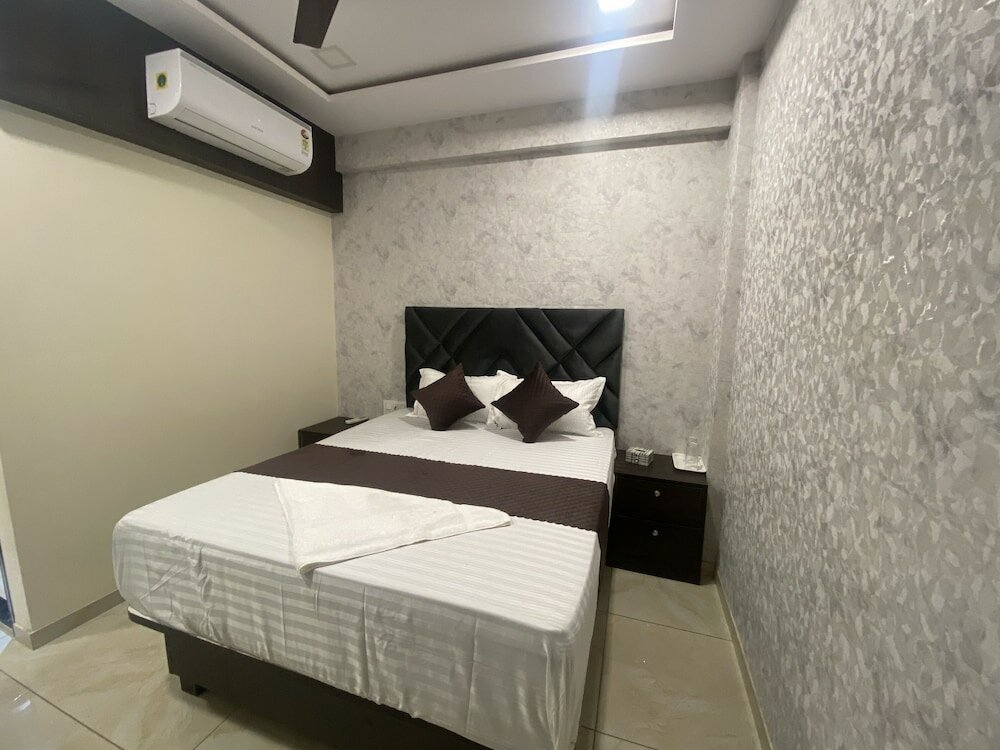 Фото Hotel Classio Inn - Kokilaben Hospital