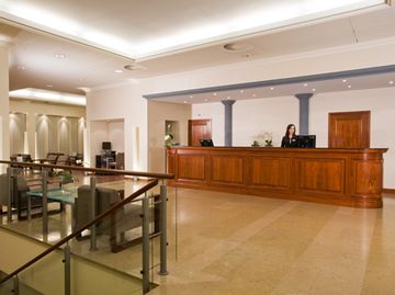 Фото Nh Fribourg Hotel