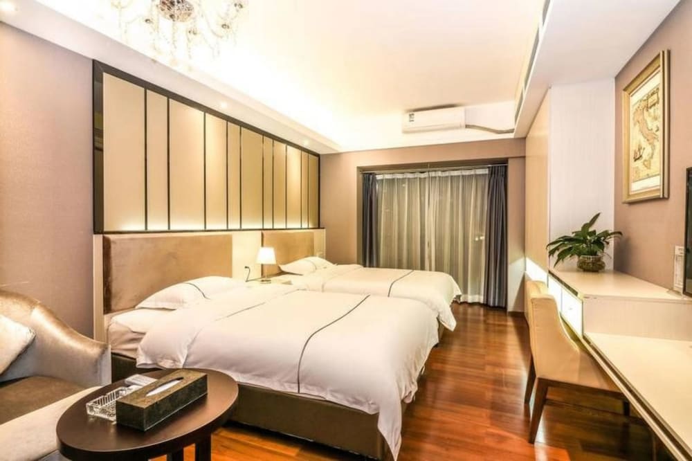 Фото BaiHe International Apartment Hotel