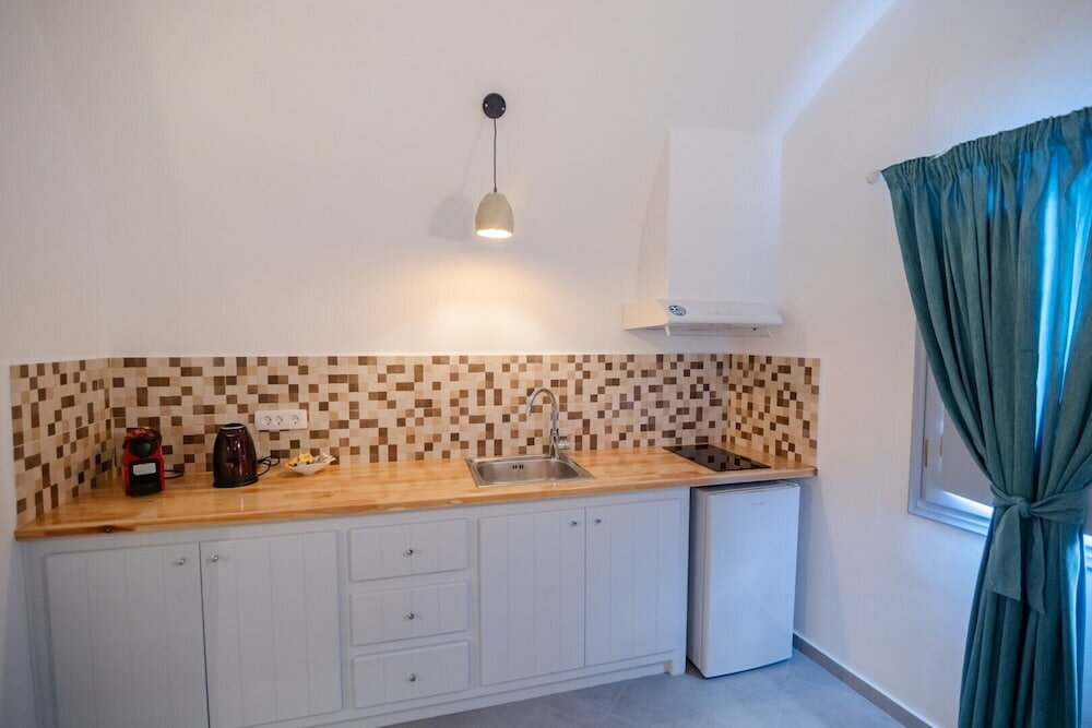 Фото Sun Angelos Oia - Luxury Cave Suites