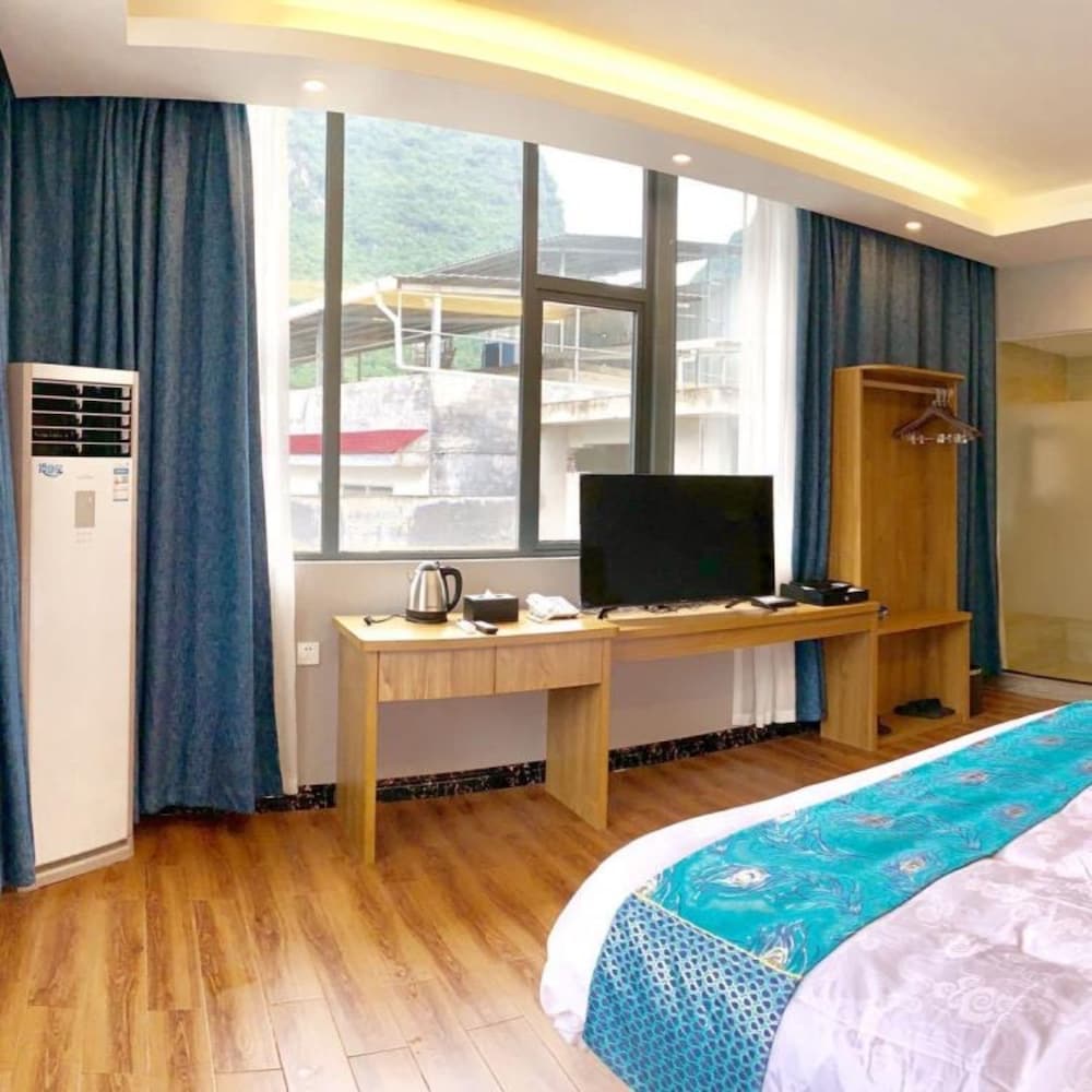 Фото Yangshuo Qingyunge Hotel