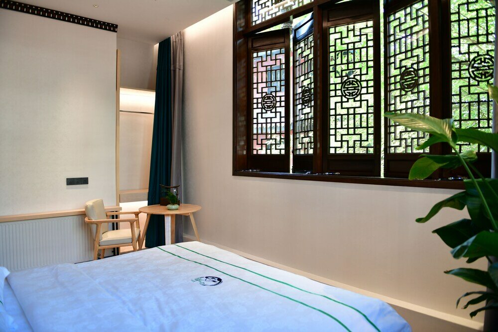 Фото Xishu Garden Inn