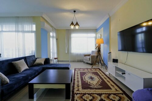 Апартаменты Central and Comfy Flat With Balcony in Muratpasa в Муратпаше