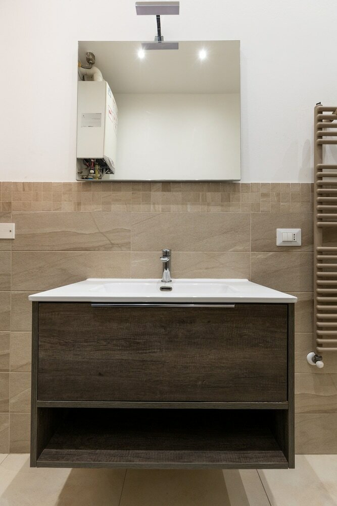 Фото Palazzina Carracci - Appartamento Tarantino