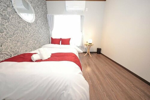 Гостиница Omotenashi House Hanazono Part 1 - 193-2 в Осаке