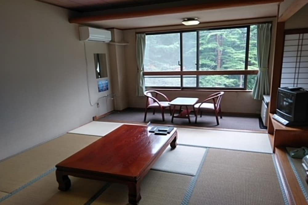 Фото Komagane Onsen Hotel