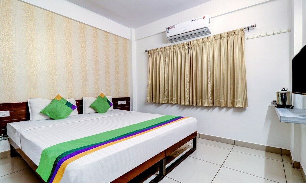 Фото Treebo Trend Saga Apartment