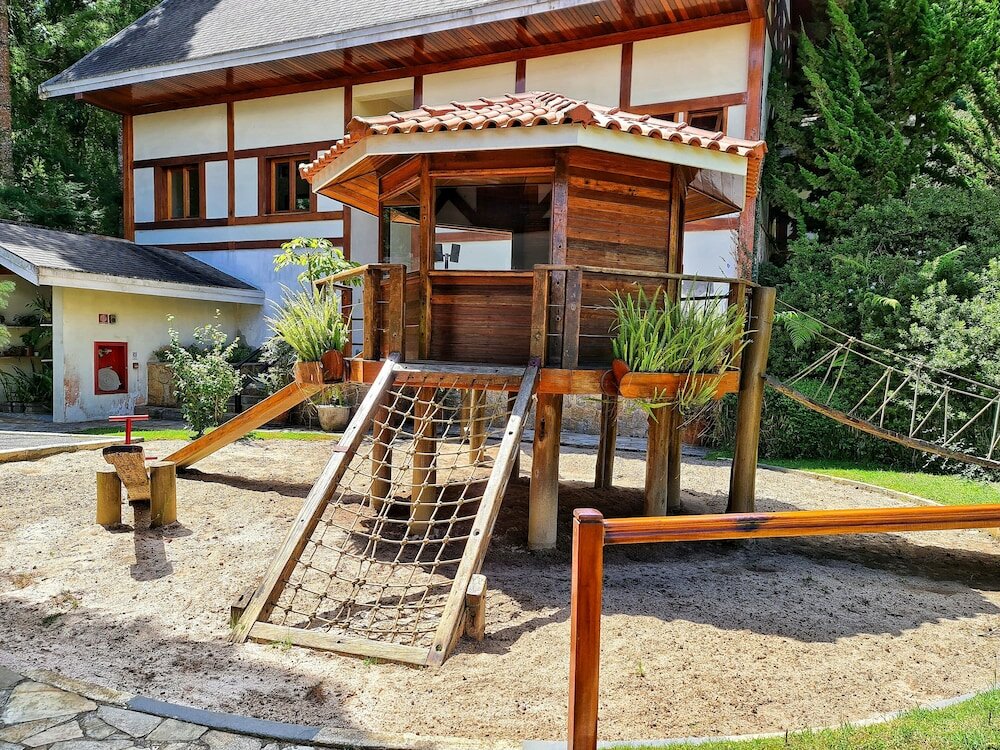 Фото Dúplex Luxo com Piscina Aquecida, Lareira e Wifi