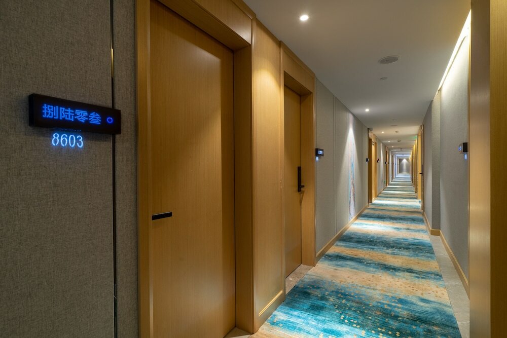 Фото Yì Wū Shì Bó Yì Měi Jū Hotel