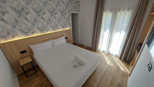 Гостиница Sweet Lloret Suites в Льорет-де-Маре