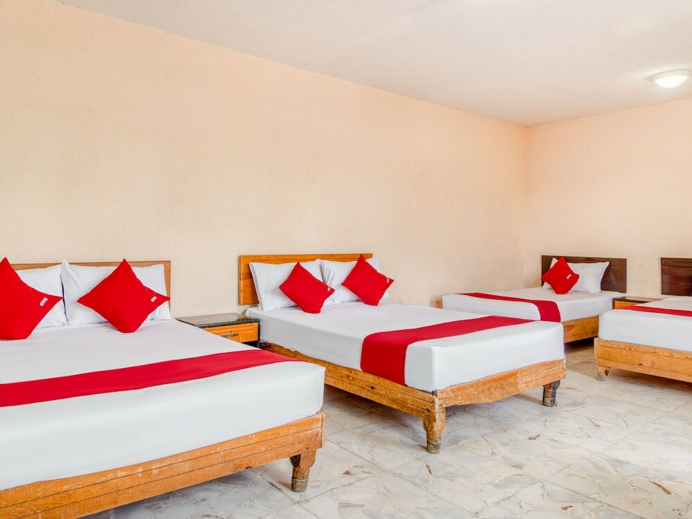 Фото Capital O Hotel La Siesta, Gómez Palacio