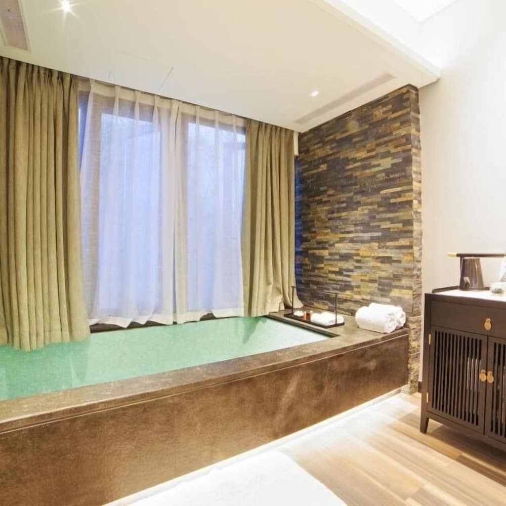 Фото Sanfang Qixiang Shuxiang Wenru Hotel