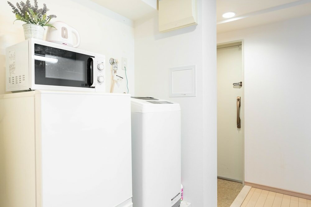Фото Shinsaibash East Nana Apartment · Junan