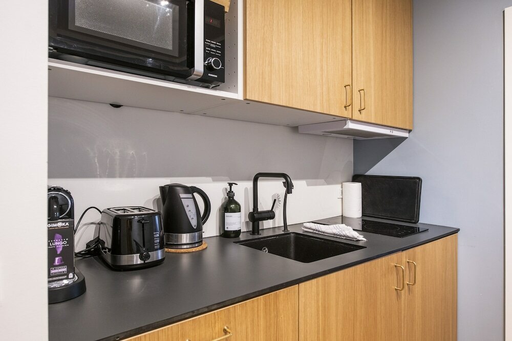 Фото By the Lakes apartments - Into This Place