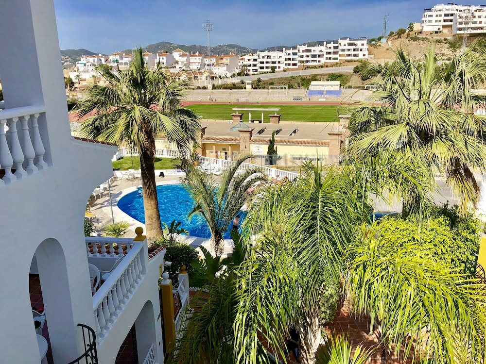 Фото Apartamentos Turísticos Las Rosas de Capistrano