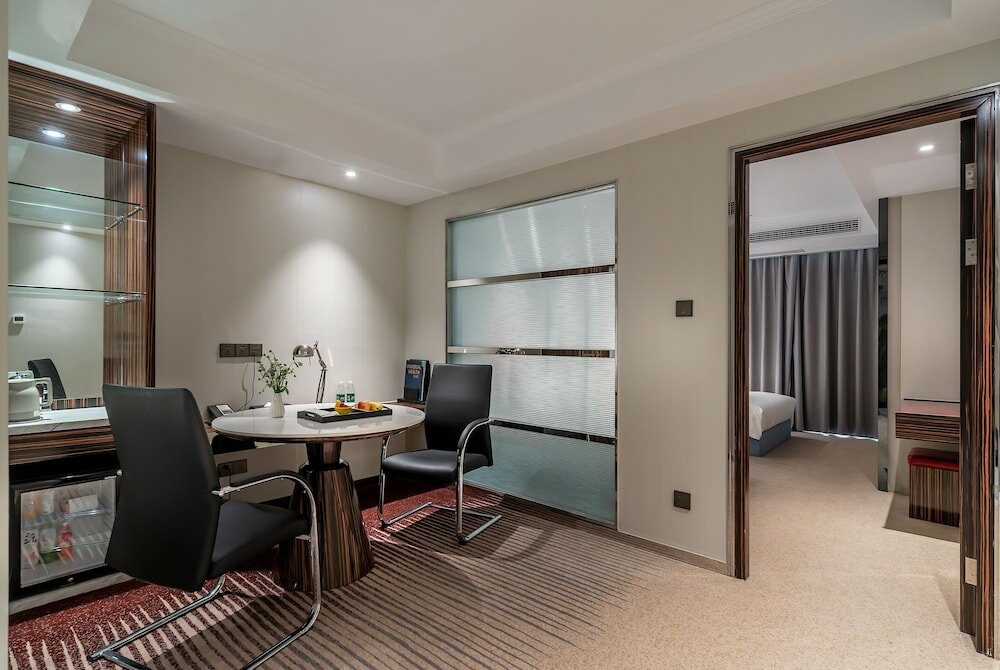 Фото Suning Universal Hotel All-Suites