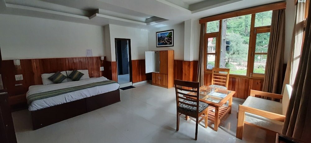 Фото Hotel Aman Palace Kasol