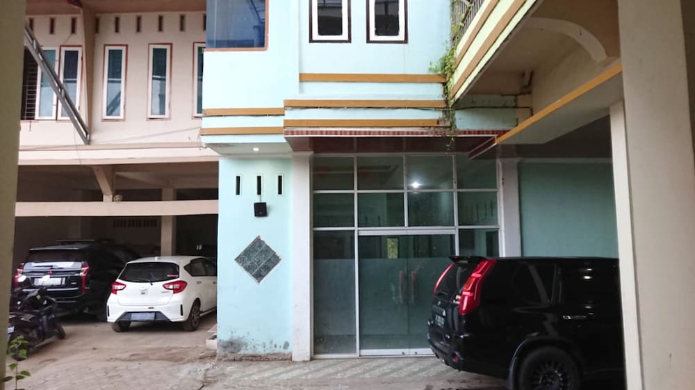 Фото Oyo 92596 Al-razzaq Guest House