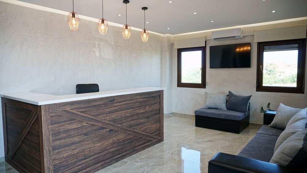 Фото Sinodinos Deluxe Apartments