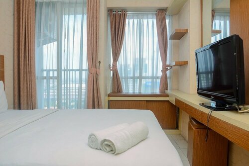 Апартаменты Comfy Studio Room at Tifolia Apartment в Джакарте