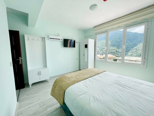 Гостиница Yesilalan Hotel Caykara в Дернекпазары