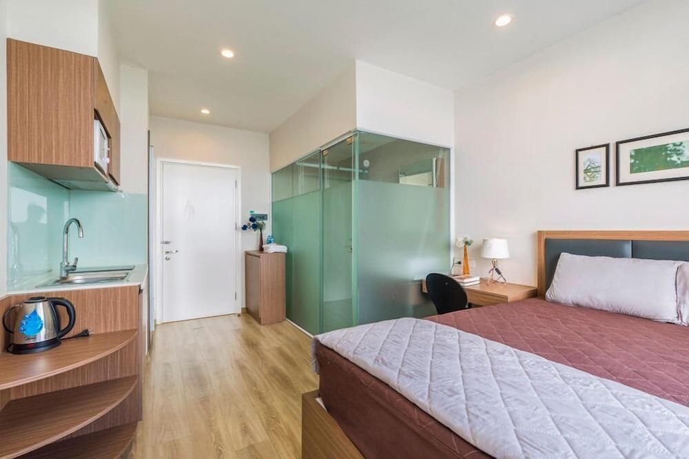 Фото Lotus Inn Serviced Apartment