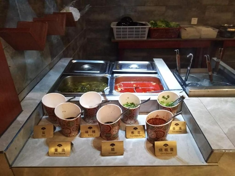 Фото Ramada Encore DaochengYading