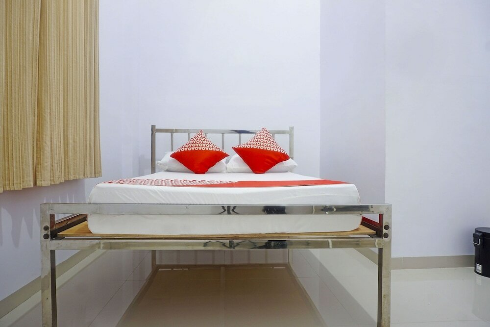 Фото Oyo 3123 Orchid Homestay Syariah