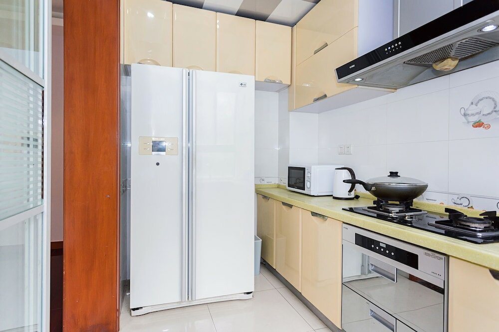 Фото Good Time Travellers Inn- Shanghai New International Expo Apartment