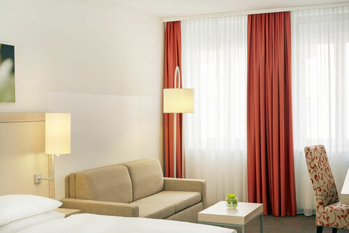 Гостиница H+ Hotel München в Мюнхене