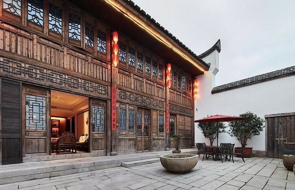 Фото Sanfang Qixiang Shuxiang Wenru Hotel