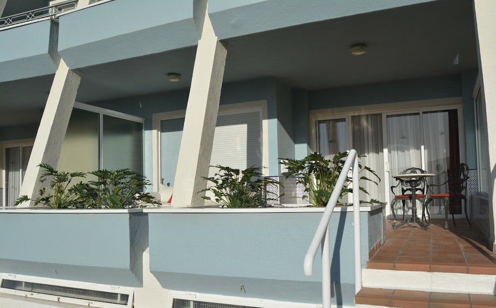 Фото Residencial La Quinta Park Suites