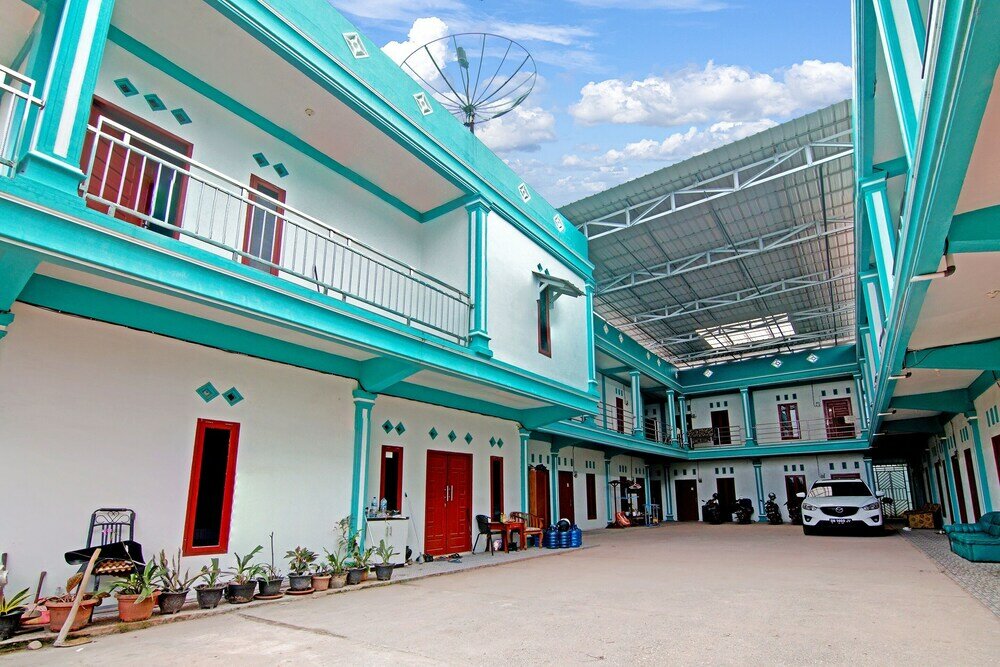 Фото Oyo 90752 Ridho Guest House Syariah