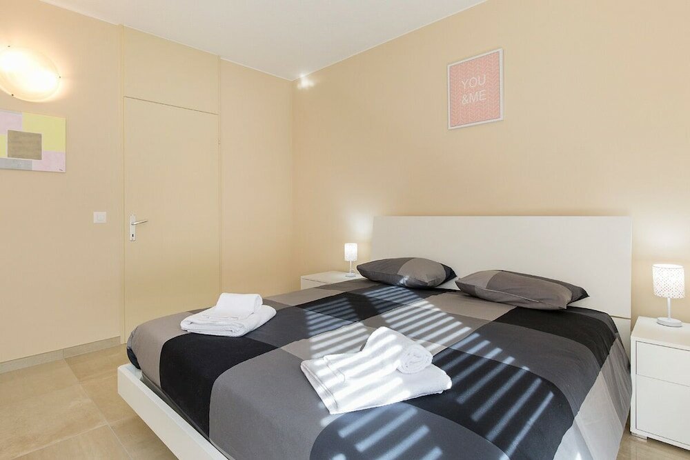 Фото Pazzallo Apartments