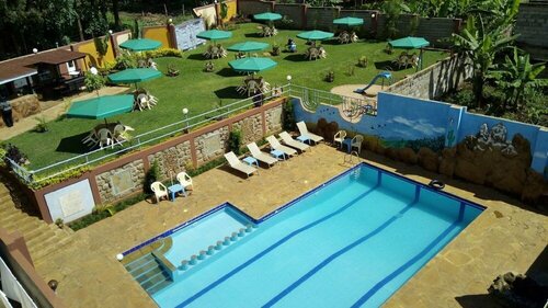 Гостиница Palmdew Highland Hotel